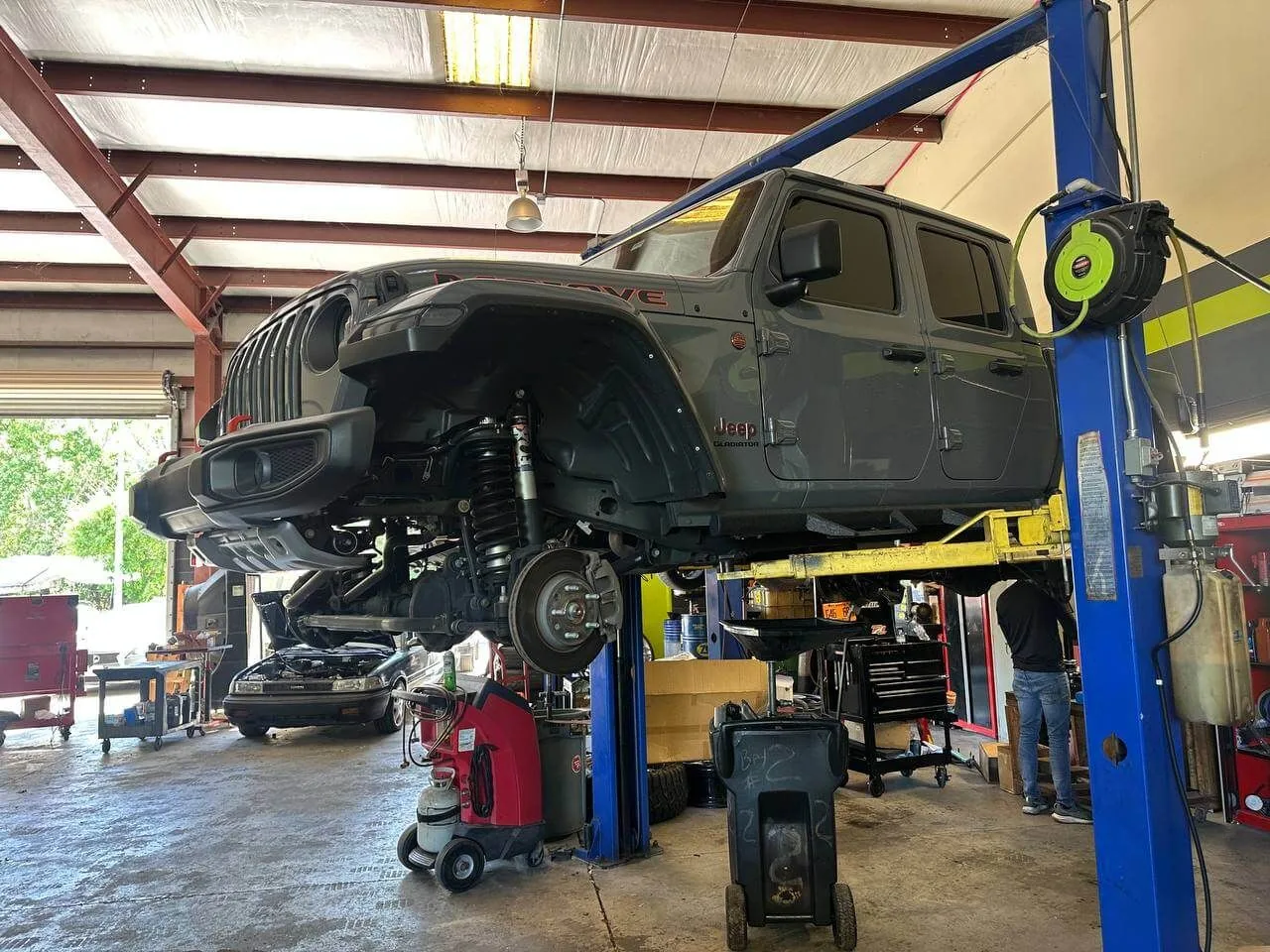 Jeep on shop lift for suspension work